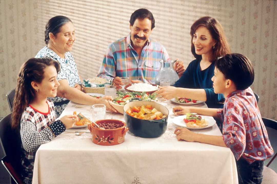 Family gathering around a dinner table for The Families Stone movie news